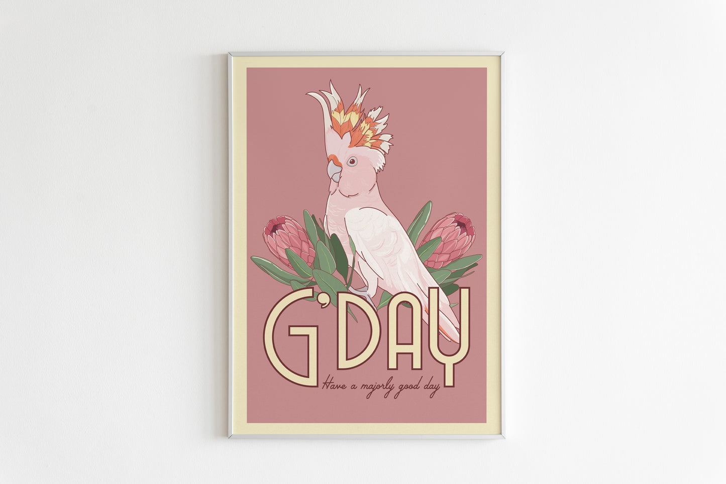 An A4 poster featuring a pink cockatoo bird with a floral pattern and the text 'G'DAY' on a pink background.